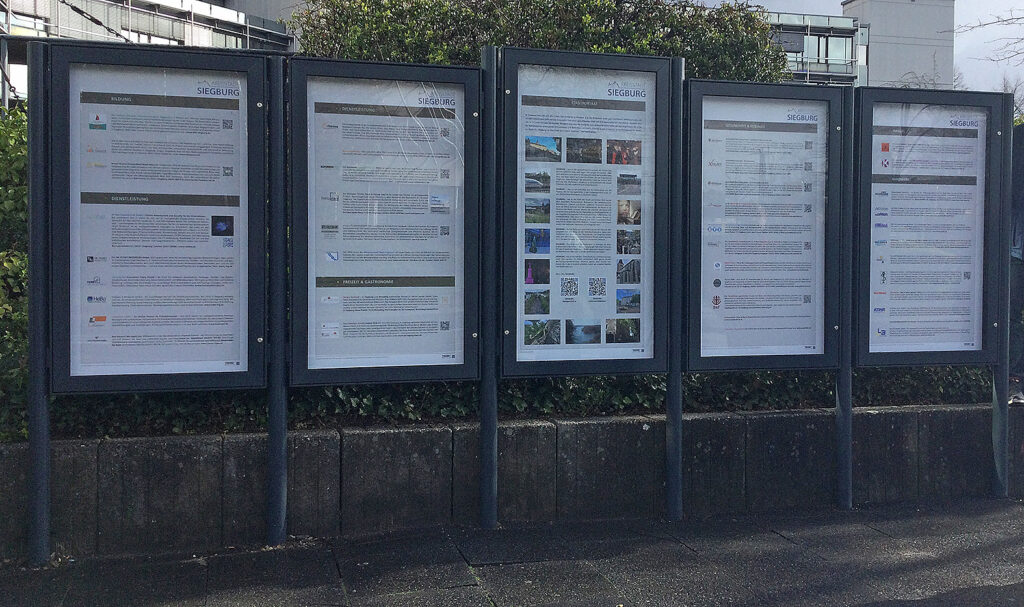 Stadt- und Wirtschaftschronik Siegburg. Fünf Text- und Bildtafeln, die verschiedene Siegburger Organisationen und Vereine abbilden.